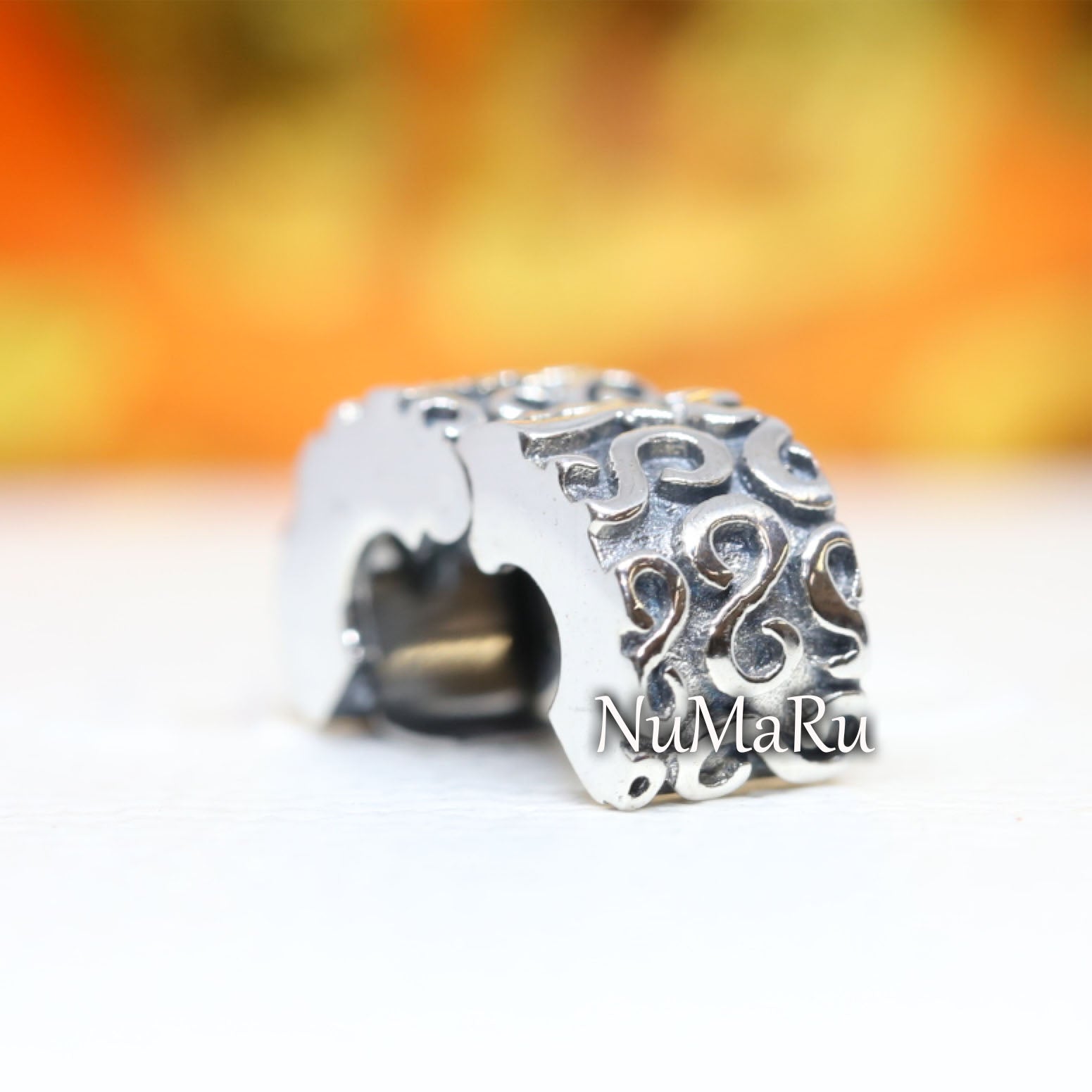 Swirl Clip Charm 790338 – NUMARU