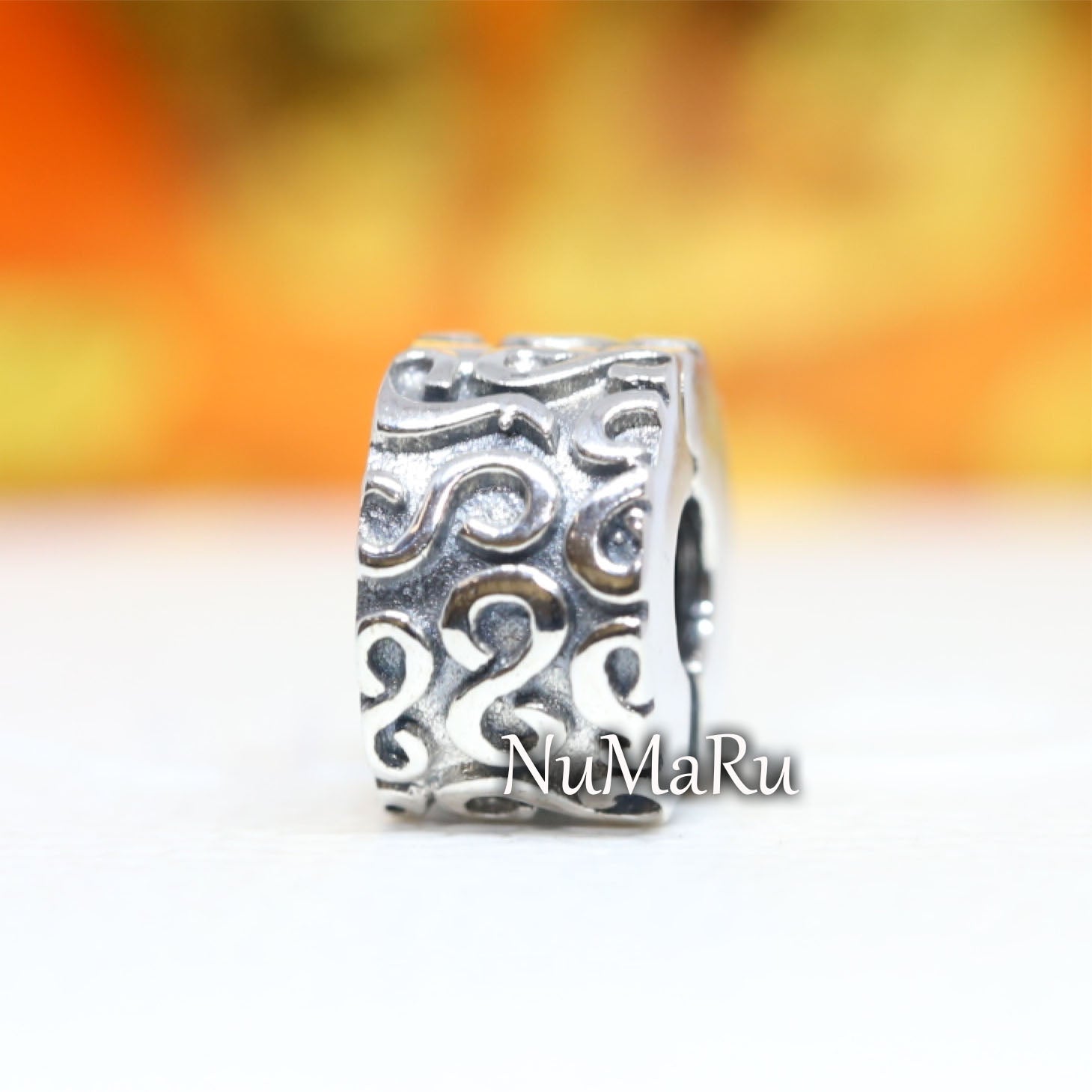 Swirl Clip Charm 790338 – NUMARU