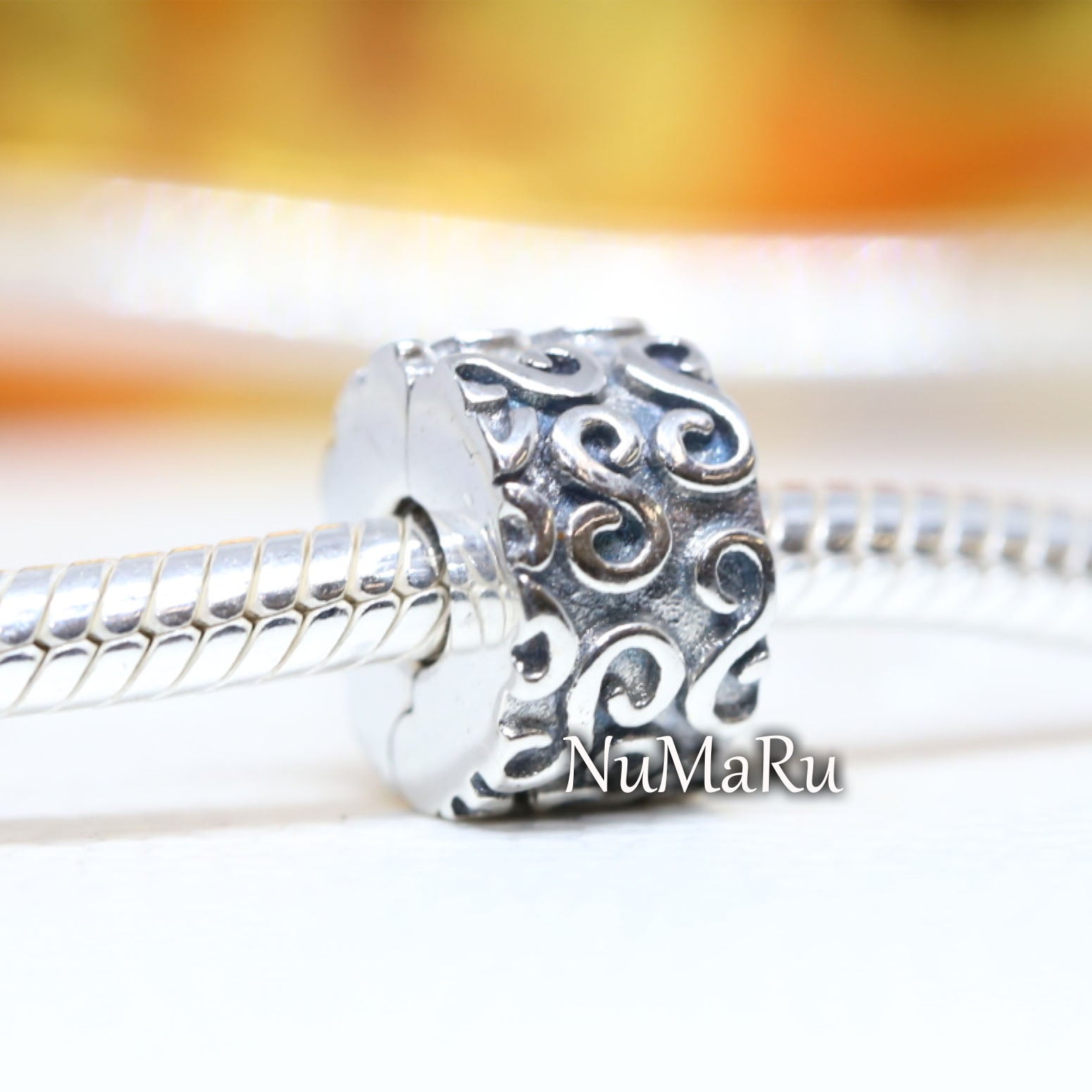 Swirl Clip Charm 790338 – NUMARU